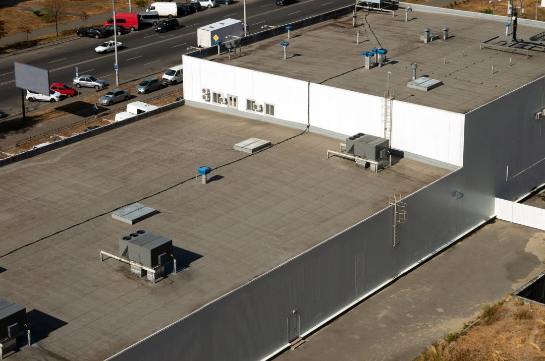 aerial shot of a commercial roof done by pillar exteriors